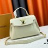 Exclusive Background Upgraded Original Version M21088 M21052 M20997 This Season, the Petite Lockme Ever Mini Bag Features Fashionably Toned Grained Calfskin Leather