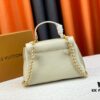 Exclusive Background Upgraded Original Version M21088 M21052 M20997 This Season, the Petite Lockme Ever Mini Bag Features Fashionably Toned Grained Calfskin Leather