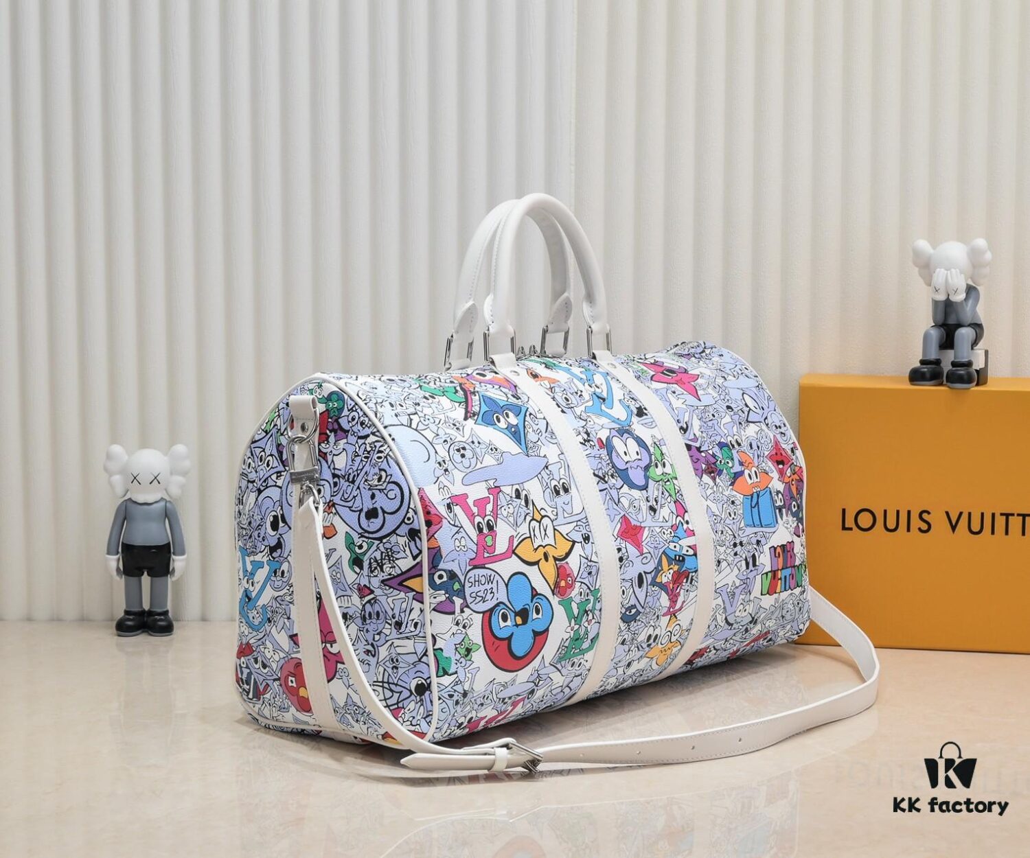 M21863 Keepall Bandoulière 50 Travel Bag with Cartoon Monogram Motif