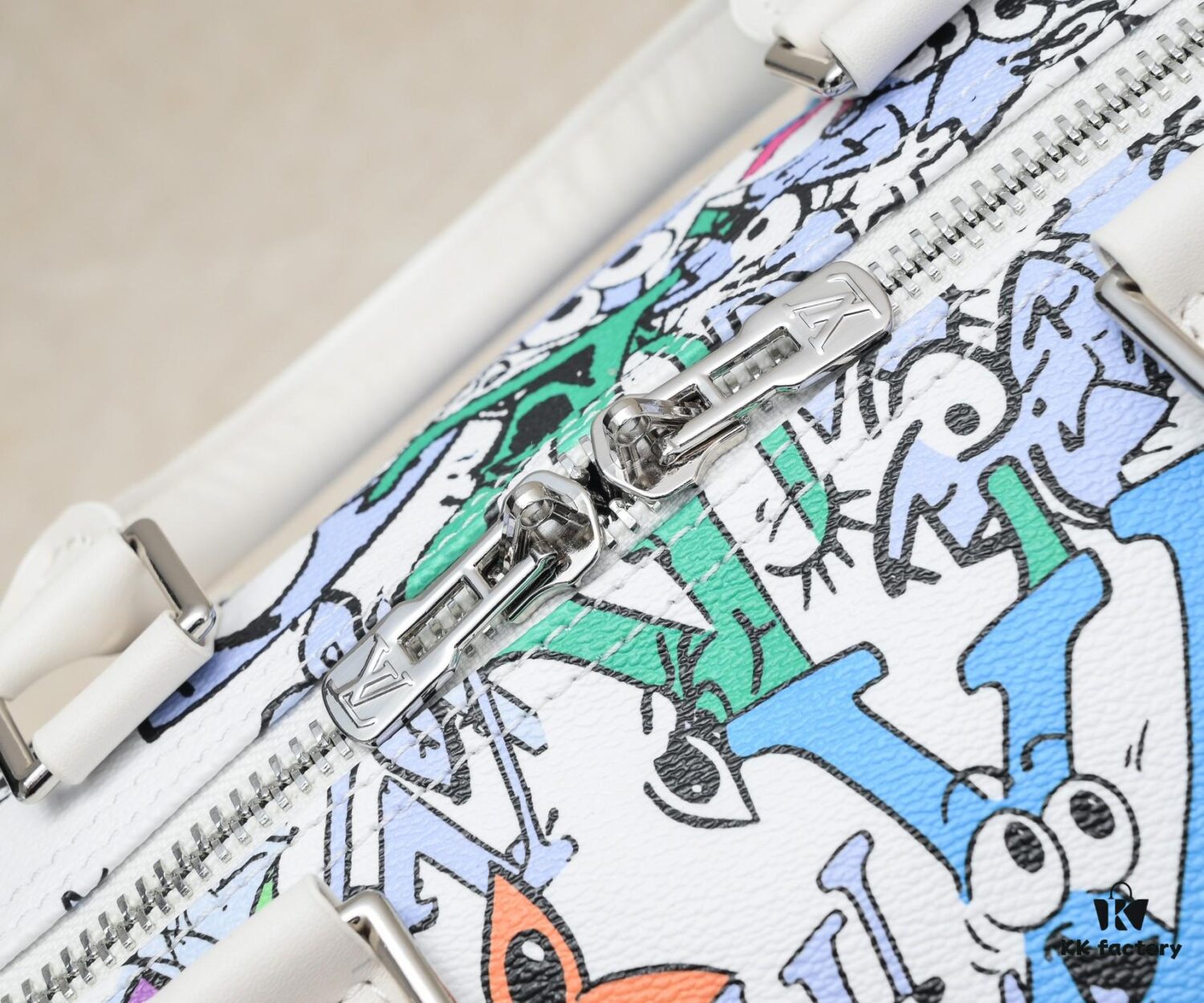 M21863 Keepall Bandoulière 50 Travel Bag with Cartoon Monogram Motif