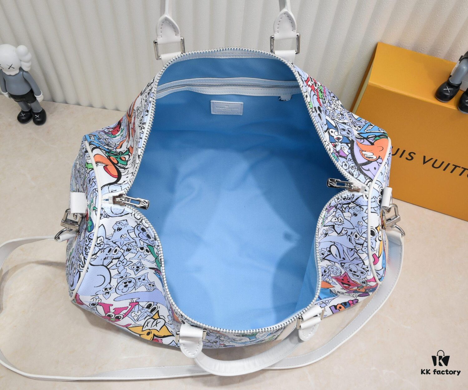 M21863 Keepall Bandoulière 50 Travel Bag with Cartoon Monogram Motif