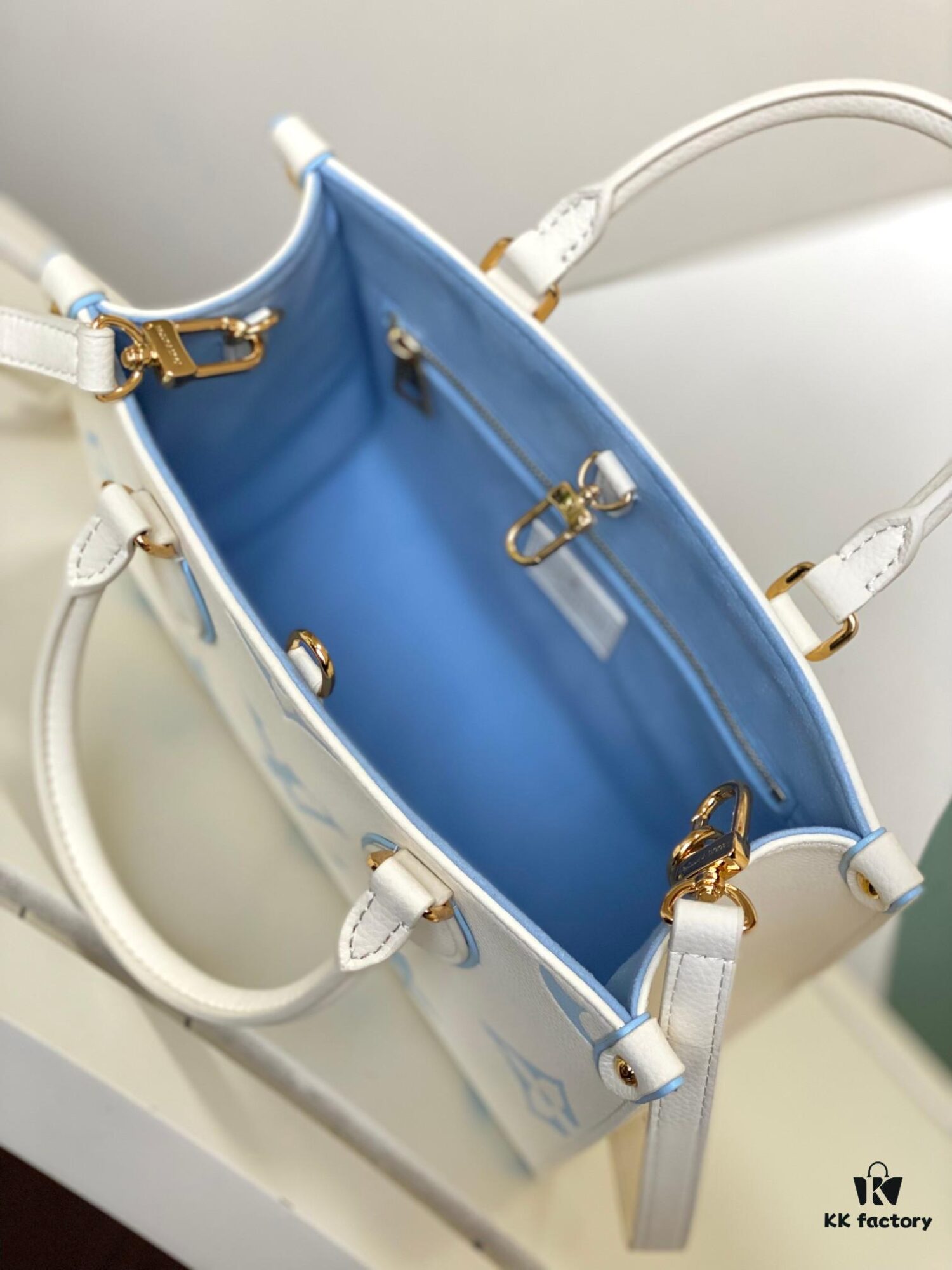 M46833 White, M45653 White Embossed, M46569 OnTheGo Small Handbag in Monogram Empreinte Leather