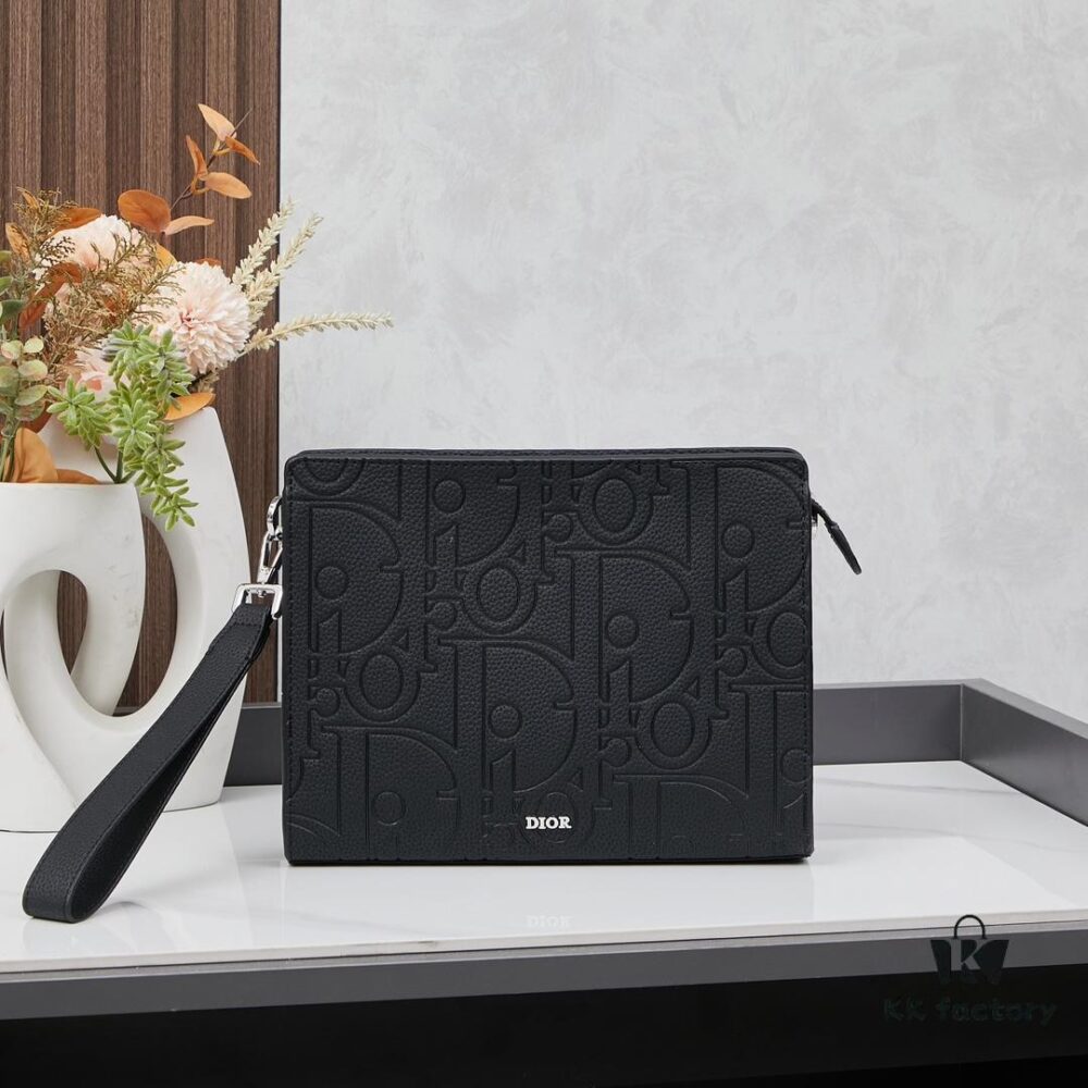 Dior Envelope Clutch with Box ||| Crafted from premium calf leather, this Dior envelope clutch draws inspiration from the brand's archives, featuring a signature Dior logo plaque on the front for elevated sophistication. Spacious zip compartment fits most smartphones, complemented by six card slots. Includes a detachable grained calfskin wrist strap with lobster clasp for versatile carrying options—either handheld or tucked into a larger handbag.