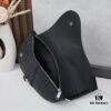 This boxed saddle bag is a new piece from the classic collection, crafted in black grained calfskin leather.