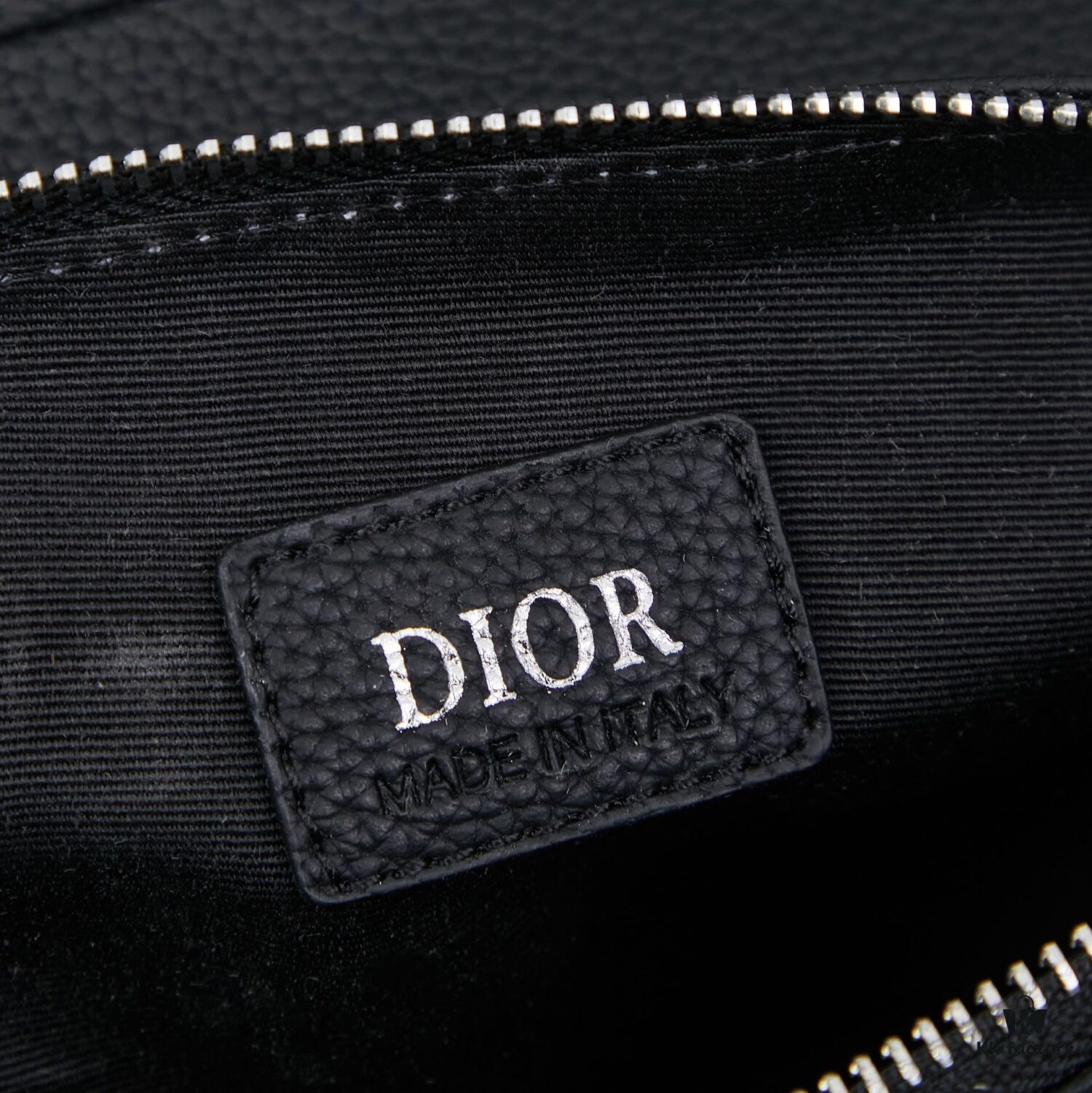 This boxed saddle bag is a new piece from the classic collection, crafted in black grained calfskin leather.