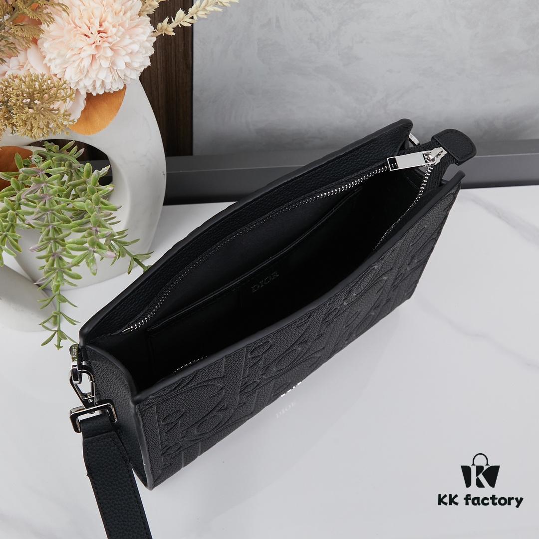 Dior Envelope Clutch with Box ||| Crafted from premium calf leather, this Dior envelope clutch draws inspiration from the brand's archives, featuring a signature Dior logo plaque on the front for elevated sophistication. Spacious zip compartment fits most smartphones, complemented by six card slots. Includes a detachable grained calfskin wrist strap with lobster clasp for versatile carrying options—either handheld or tucked into a larger handbag.