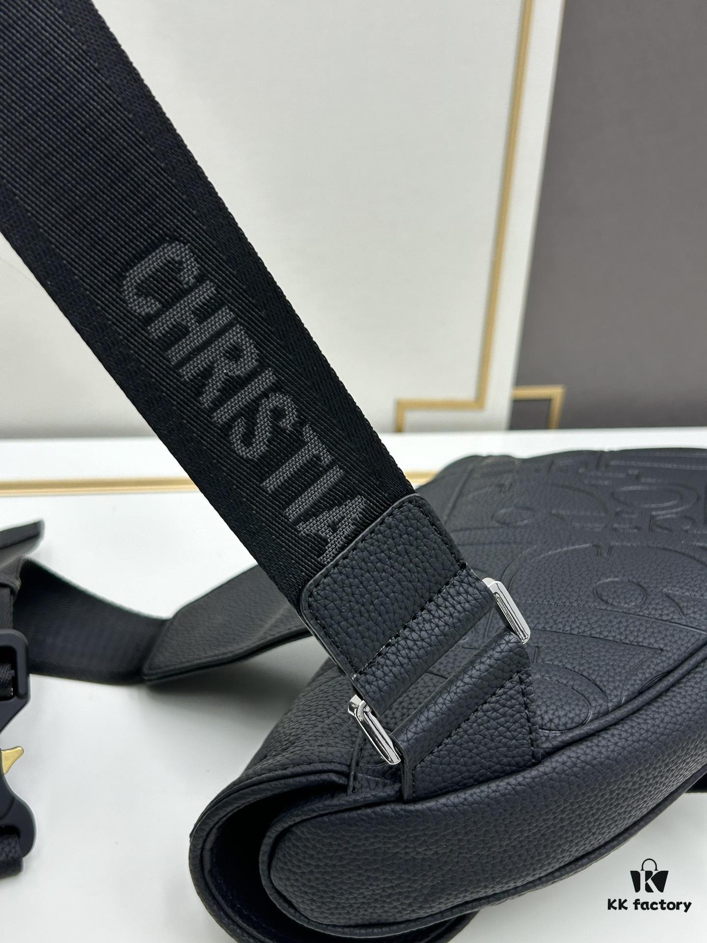 This boxed saddle bag is a new piece from the classic collection, meticulously crafted from black grained leather. A magnetic flap conceals a zip pocket for daily essentials, and it features an adjustable Christian Dior jacquard webbing strap for shoulder or crossbody wear.