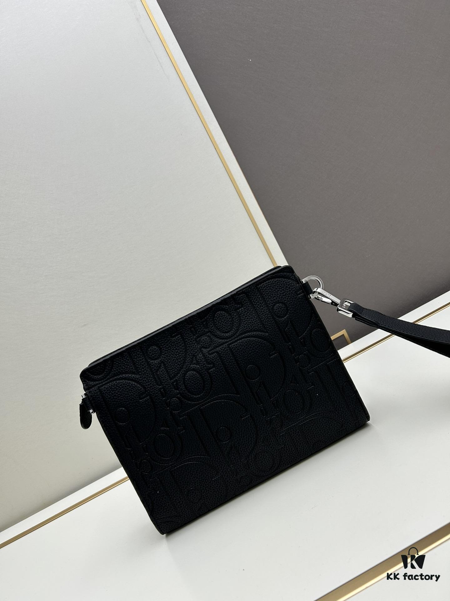 Dior Clutch with Box ||| This clutch is a signature piece from Dior, crafted meticulously from cowhide leather and inspired by the Dior archives. It features a prominent Dior logo on the front for elevated sophistication.