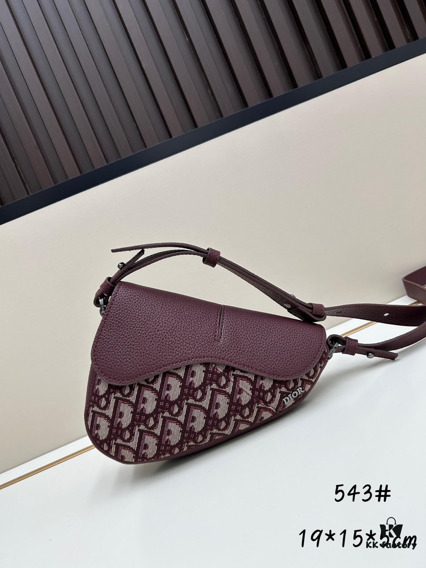 This saddle bag reinterprets the classic design with a modern structure. Crafted from beige and black Oblique printed fabric, it features a signature grained black calfskin magnetic flap and hidden zip closure. The interior includes a spacious compartment and slip pocket for daily essentials. The mini style comes with an adjustable, detachable leather shoulder strap, allowing for handheld, shoulder, or crossbody wear.