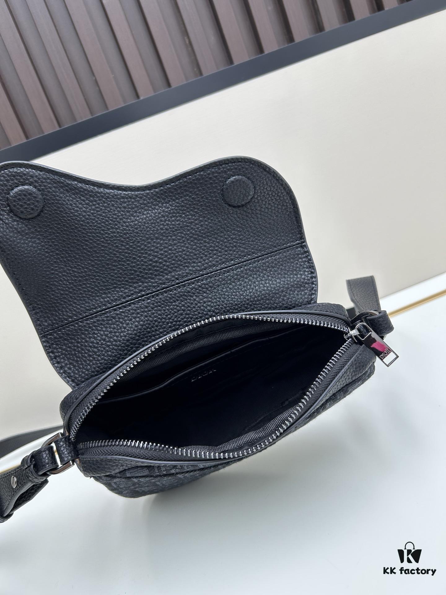 This saddle bag reinterprets the classic design with a modern structure. Crafted from beige and black Oblique printed fabric, it features a signature black grained calfskin magnetic flap and a concealed zip closure. The interior includes a large compartment and slip pockets for organizing daily essentials. This mini style comes with an adjustable and detachable leather shoulder strap, allowing for versatile wear as a handheld, shoulder, or crossbody bag.