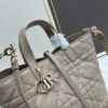 Medium and Small Dior Toujours Vertical Handbag in Soft Raspberry Beige Calfskin with Cannage Stitching