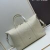 Weekender 25 Handbag in Elegantly Designed Beige Calfskin with Dior Gravity Embossed Pattern