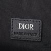 This toiletry bag combines practical functionality with minimalist design. Crafted from black CD Diamond canvas inspired by the Dior archives, it features smooth calf leather trims in matching tones and a signature Dior emblem on the front.