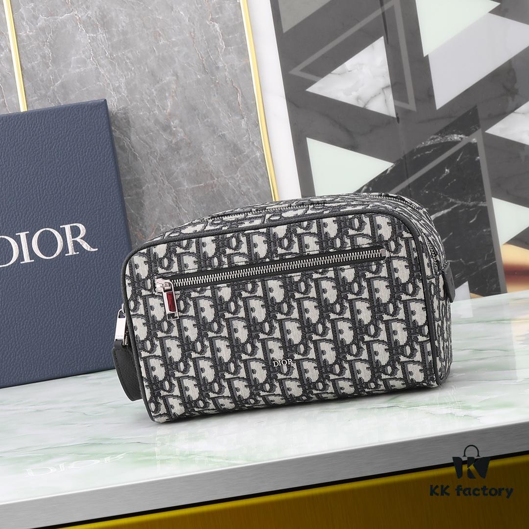 This toiletry bag combines practical functionality with minimalist design, crafted in beige and black Oblique printed fabric with black grained leather trims, featuring the Dior logo on the front.