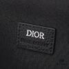 This toiletry bag combines practical functionality with minimalist design. Crafted from black Oblique-print fabric, it features grained calfskin leather trims in matching tones and is adorned with a Dior signature on the front. The front features a zip pocket, a spacious main zipped compartment, and two slip pockets. Equipped with a leather handle, it can be carried by hand or stored inside various handbags.