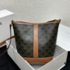 Celine Triomphe Canvas Nano Bucket Bag in Latest Size, Signature Print, Artificial Leather and Cowhide, Perfect for Winter Wear with Coats