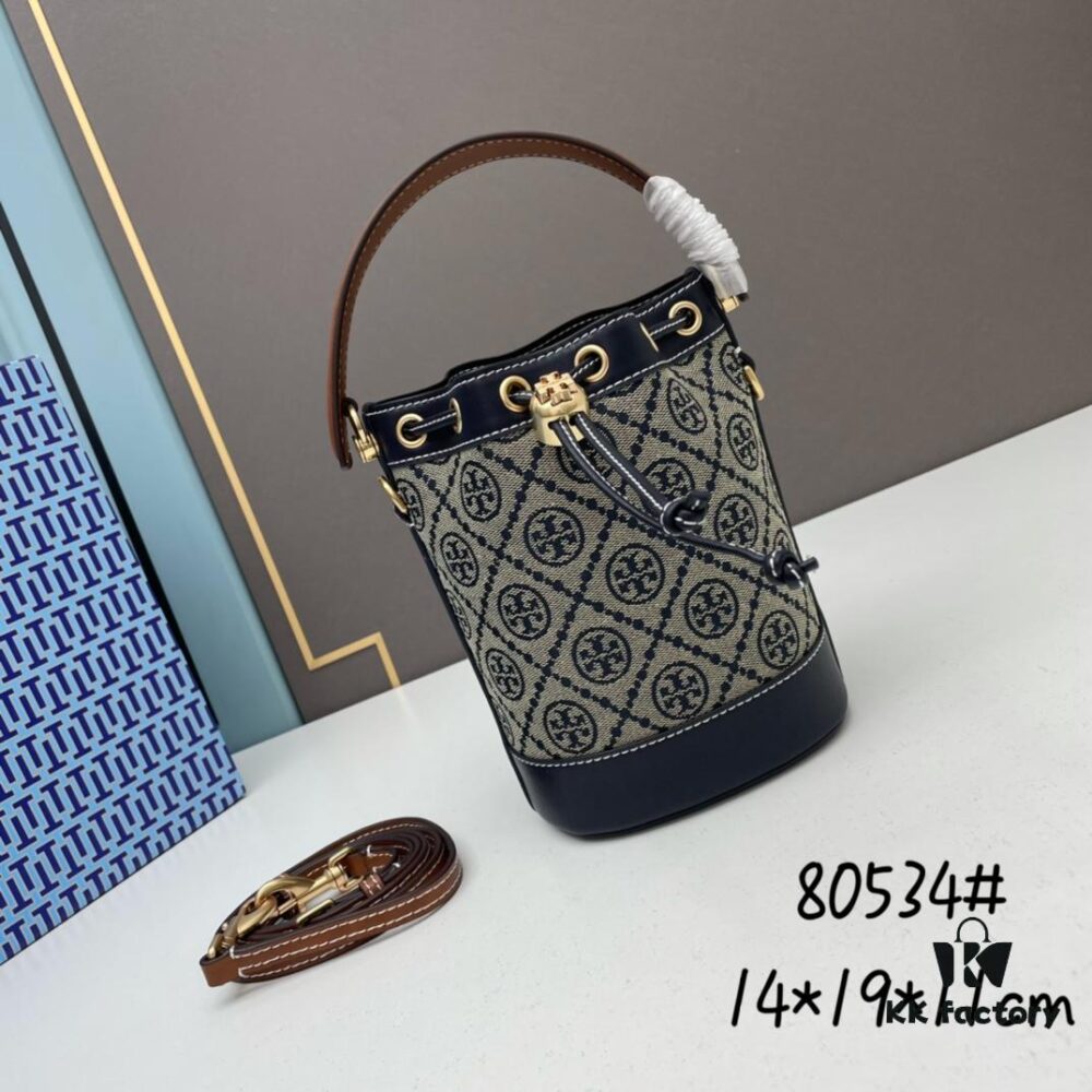 Hazel Color TORY BURCH Monogram 2021 Summer Drawstring Bucket Bag in Textured Navy Canvas with Vintage Jacquard Detail