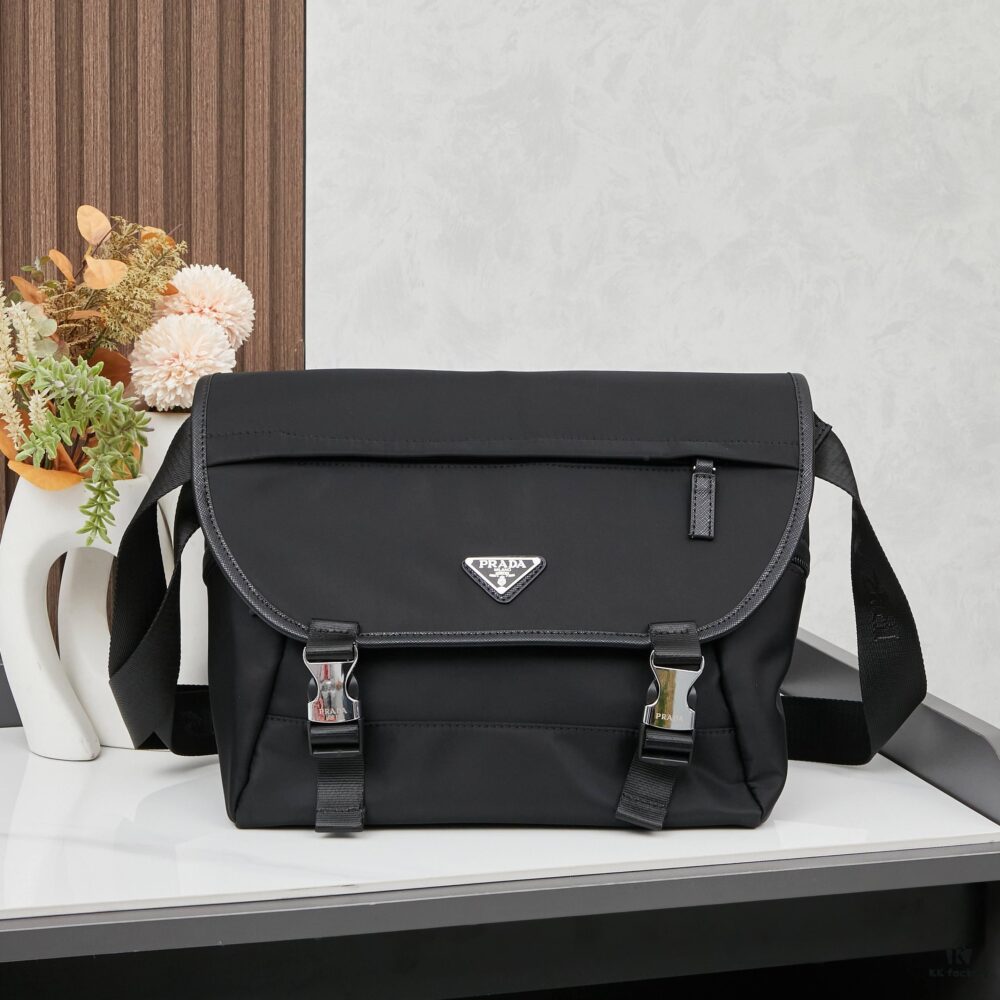 Prada RE-NYLON Recycled Nylon and Saffiano Leather Shoulder Bag! Crossbody Messenger Bag, Unisex! Parachute Fabric with Crosshatch Calfskin, Zippered Pocket at Back, Additional Zippered Compartment on Flap! Two Snap Closures at Opening for Security and Practicality! Adjustable Shoulder Strap! Size 30 x 25 cm, Model 2387