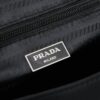 Prada RE-NYLON Recycled Nylon and Saffiano Leather Shoulder Bag! Crossbody Messenger Bag, Unisex! Parachute Fabric with Crosshatch Calfskin, Zippered Pocket at Back, Additional Zippered Compartment on Flap! Two Snap Closures at Opening for Security and Practicality! Adjustable Shoulder Strap! Size 30 x 25 cm, Model 2387