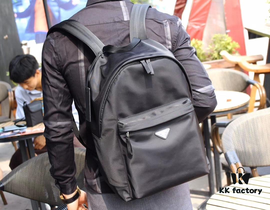 Prada Men's Black Parachute Nylon Backpack, Stylish Design with Inverted Triangle Logo, Lightweight, Spacious and Waterproof