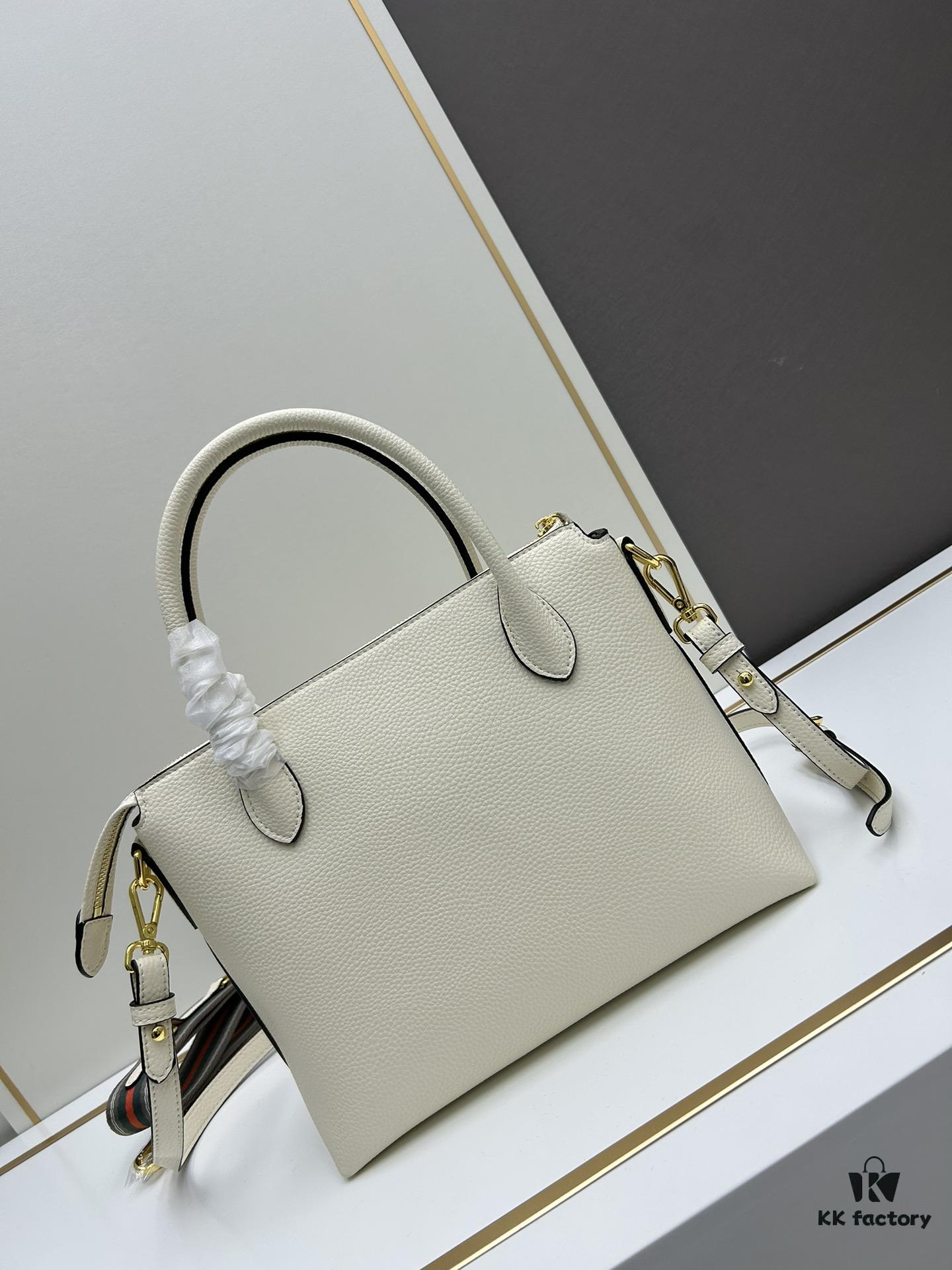 PRADA Classic Reissue Leather Bag with Dual Shoulder Straps, Calfskin, Double Top Handles, Removable Adjustable Leather Strap, Removable Adjustable Colorful Fabric Strap, Gold-Tone Hardware, Engraved Metal Logo, Zip Closure, Two Interior Pockets, Jacquard PRADA Logo Lining