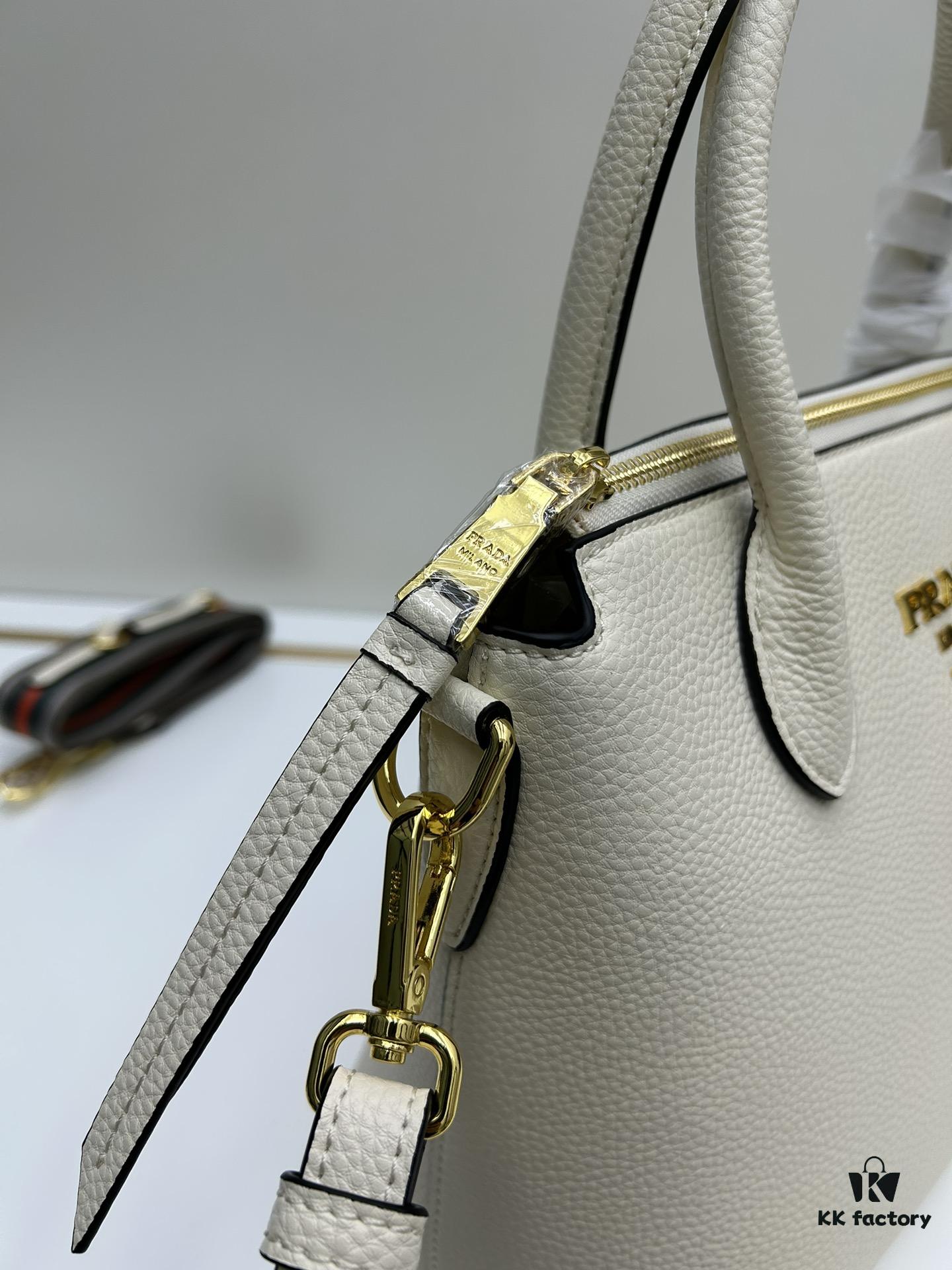 PRADA Classic Reissue Leather Bag with Dual Shoulder Straps, Calfskin, Double Top Handles, Removable Adjustable Leather Strap, Removable Adjustable Colorful Fabric Strap, Gold-Tone Hardware, Engraved Metal Logo, Zip Closure, Two Interior Pockets, Jacquard PRADA Logo Lining