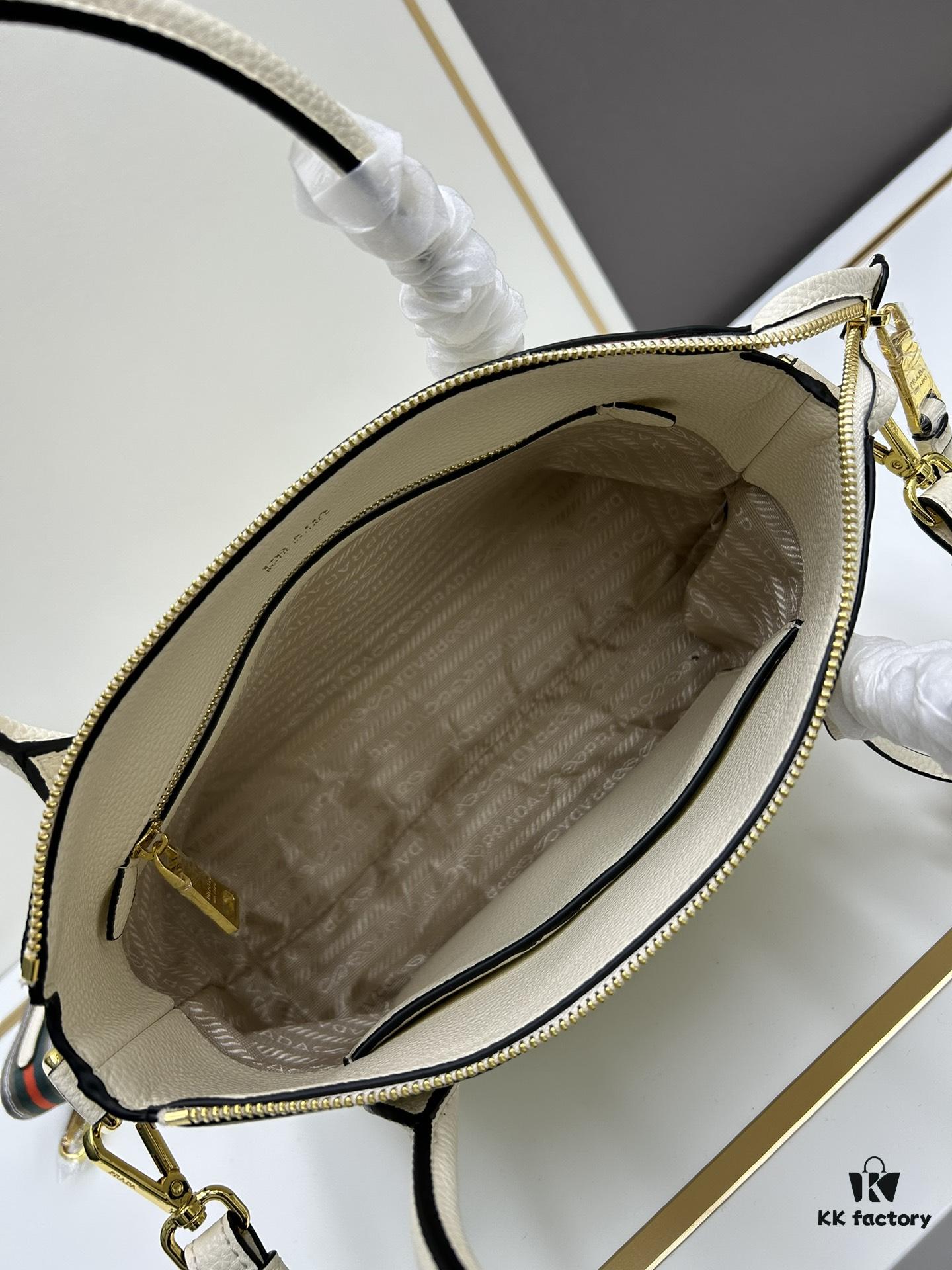 PRADA Classic Reissue Leather Bag with Dual Shoulder Straps, Calfskin, Double Top Handles, Removable Adjustable Leather Strap, Removable Adjustable Colorful Fabric Strap, Gold-Tone Hardware, Engraved Metal Logo, Zip Closure, Two Interior Pockets, Jacquard PRADA Logo Lining