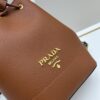 Prada New Arrival, Calfskin Leather with Pebbled Texture, Comes with Two Shoulder Straps – One Leather Strap and One Colorful Woven Strap for Stylish Versatility