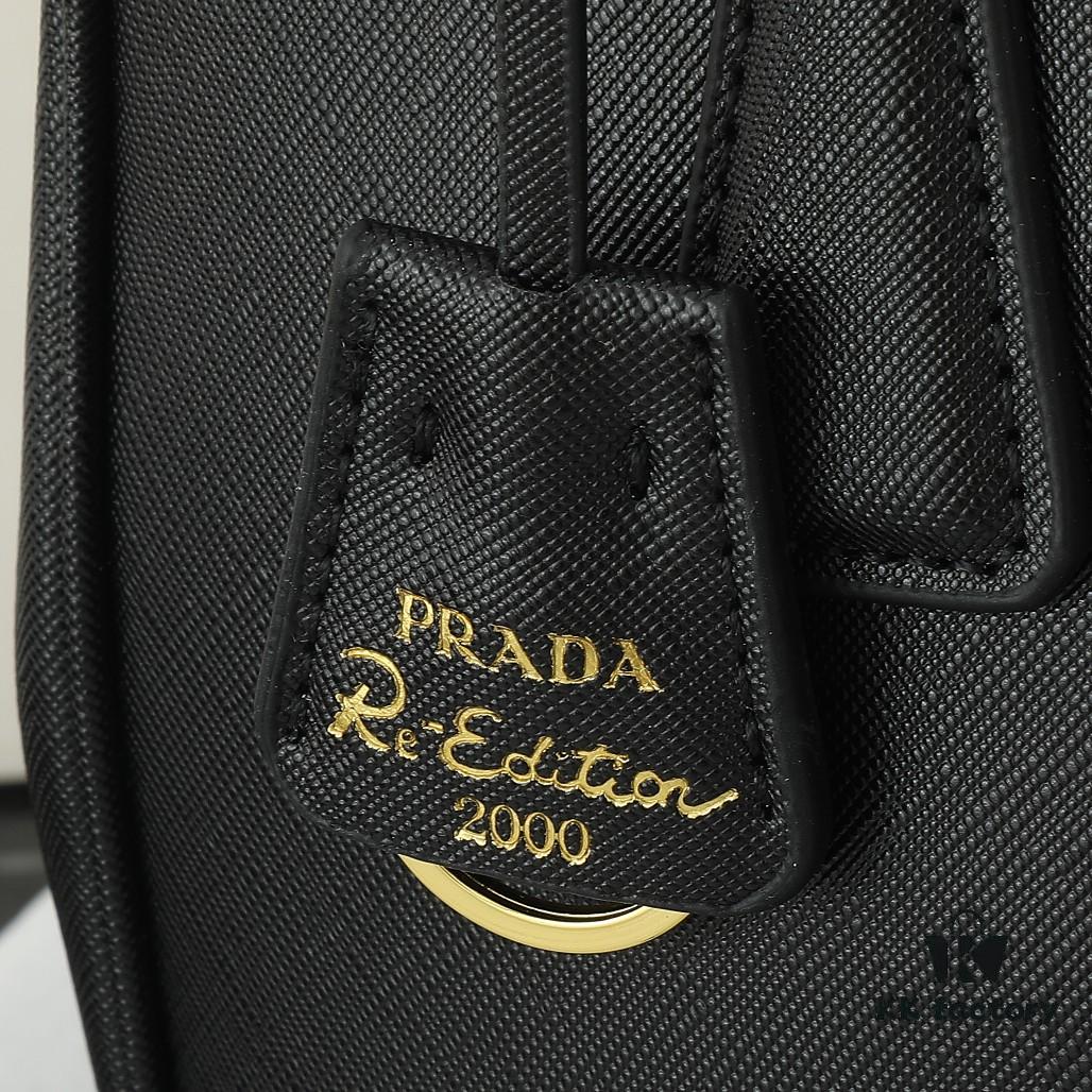 House Super Hot Killer Bag, Saffiano Leather, Dual Top Handles, Detachable Adjustable Leather Shoulder Strap, Gold-Tone Hardware, Triangle Logo with Metal Lettering on Leather, Snap Button Closure on Side, Two Outer Zip Pockets, Three Interior Pockets Including One with Zipper, Prada-Branded Lining