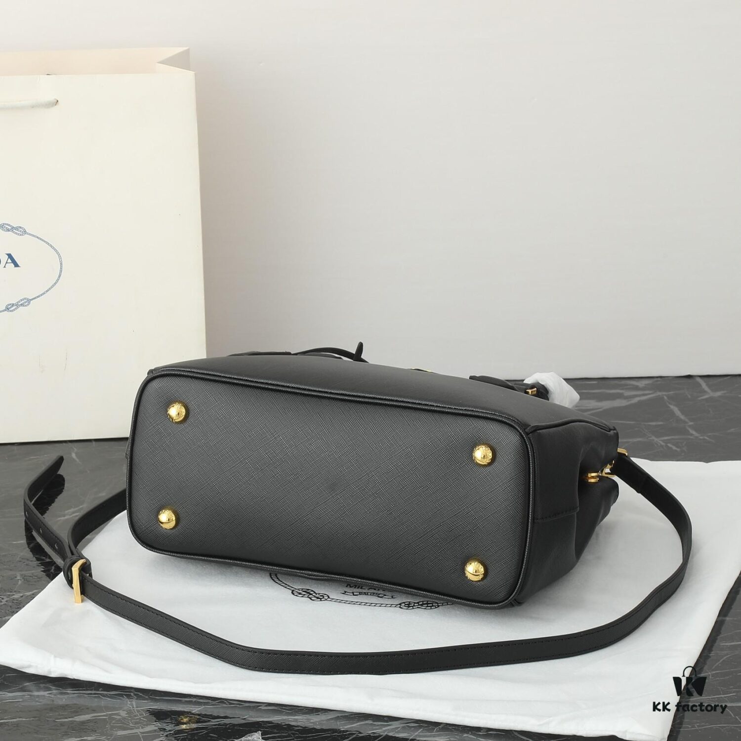 House Super Hot Killer Bag, Saffiano Leather, Dual Top Handles, Detachable Adjustable Leather Shoulder Strap, Gold-Tone Hardware, Triangle Logo with Metal Lettering on Leather, Snap Button Closure on Side, Two Outer Zip Pockets, Three Interior Pockets Including One with Zipper, Prada-Branded Lining