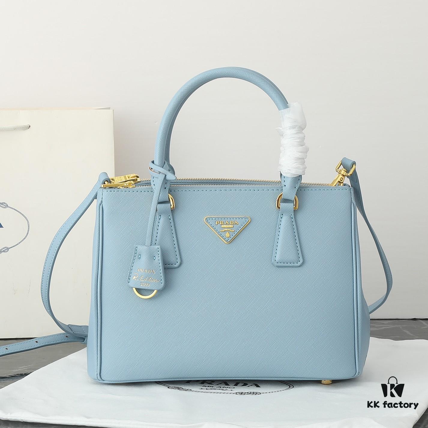 Model 1018 Home Super Hot Killer Bag, Saffiano Leather with Dual Top Handles, Detachable Adjustable Leather Shoulder Strap, Gold-Plated Hardware, Metal Logo Lettering on Triangular Leather Patch, Snap Button Closure on Side, Two Exterior Zip Pockets, Three Interior Pockets Including One Zip Pocket, Prada-Branded Lining