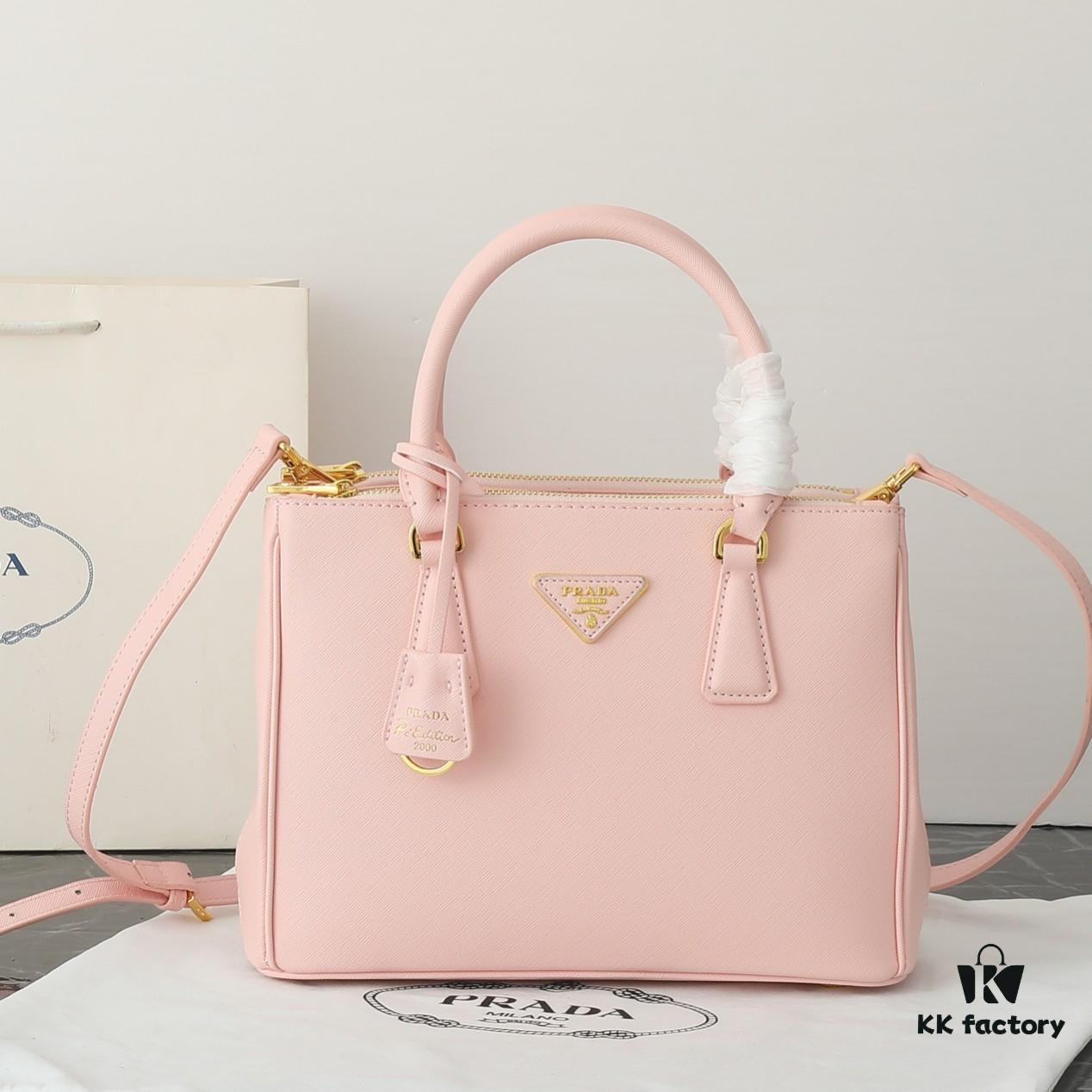 Model 1018 House Super Hot Killer Bag, Saffiano Leather with Dual Top Handles, Detachable Adjustable Leather Shoulder Strap, Gold-Tone Hardware, Metal Logo on Triangular Leather Patch, Snap Button Closure on Side, Two Zippered Outer Pockets, Three Interior Pockets Including One Zippered Compartment, Prada-Branded Lining