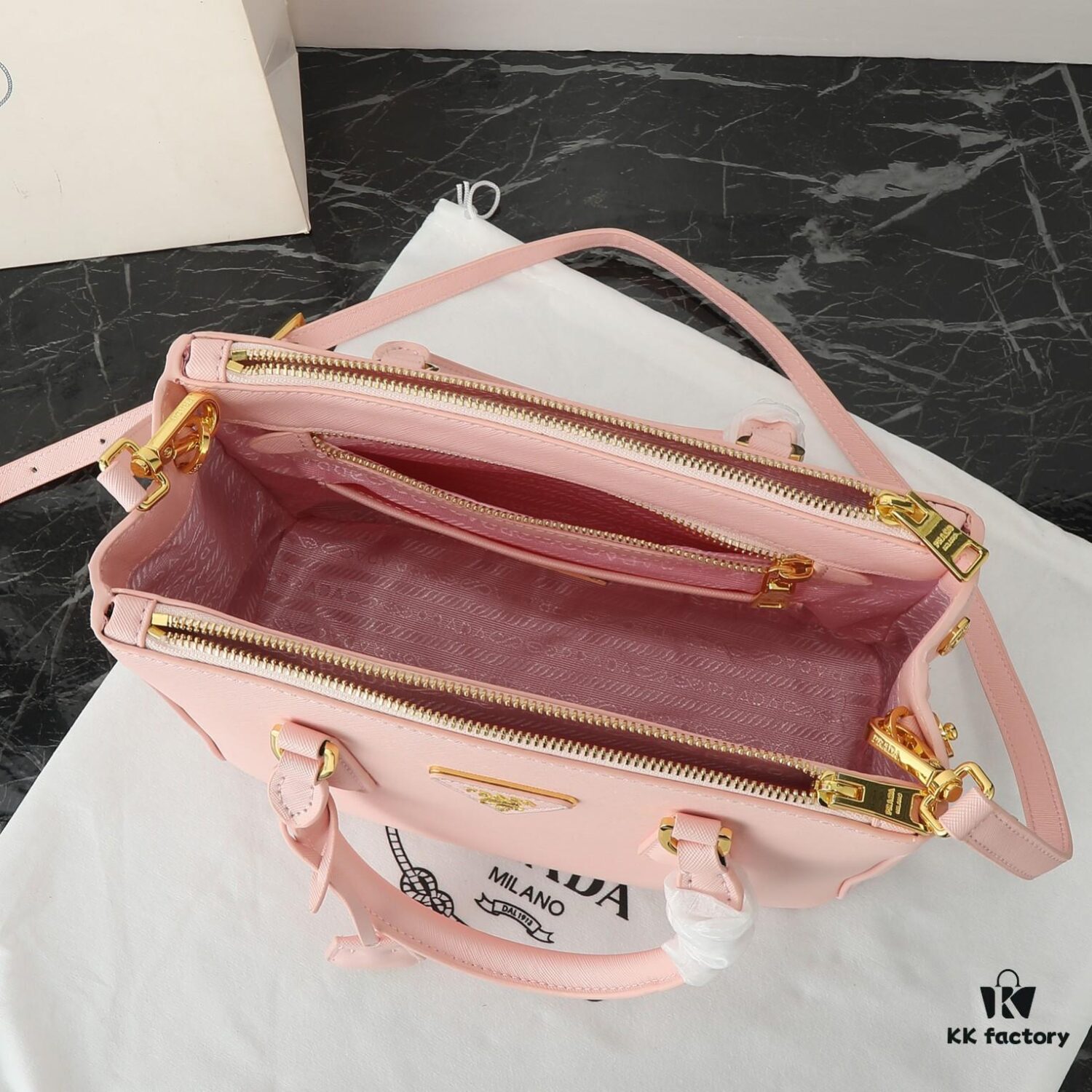 Model 1018 House Super Hot Killer Bag, Saffiano Leather with Dual Top Handles, Detachable Adjustable Leather Shoulder Strap, Gold-Tone Hardware, Metal Logo on Triangular Leather Patch, Snap Button Closure on Side, Two Zippered Outer Pockets, Three Interior Pockets Including One Zippered Compartment, Prada-Branded Lining