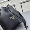 Prada New Arrival, Calfskin Leather with Pebbled Texture, Dual Shoulder Straps – One Leather Strap and One Colorful Woven Strap, Stylish and Versatile for Handheld or Crossbody Wear