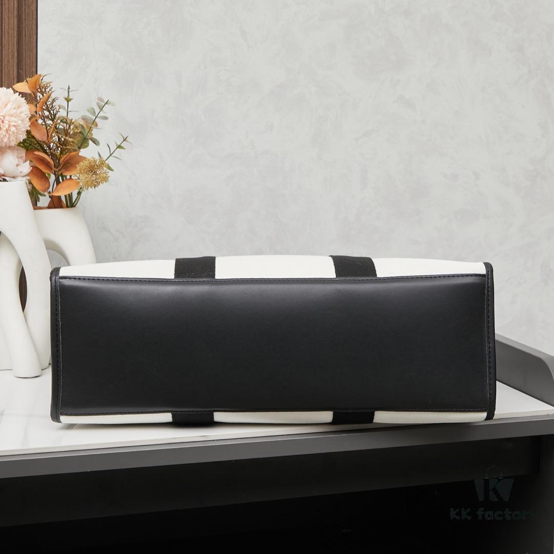 Large Balenciaga Hardware Tote – A modern interpretation of a canvas bag originally developed for the Marine Corps