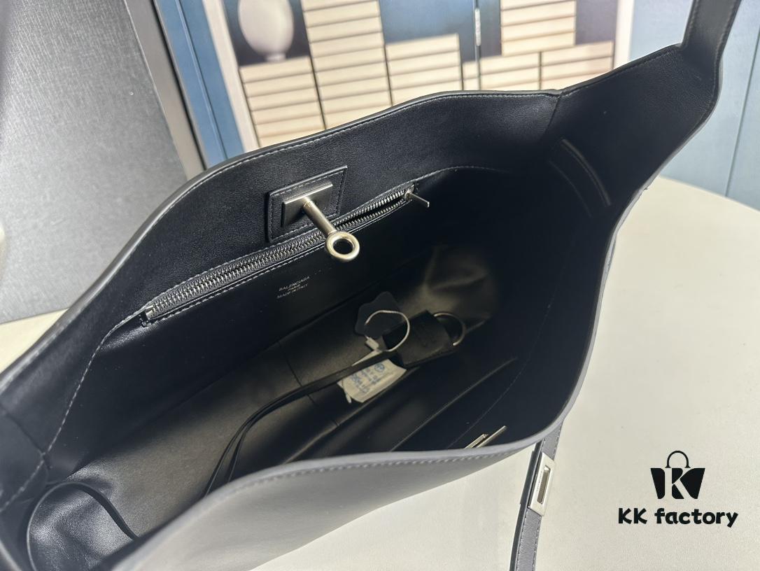 New BALENCIAGA Winter 24 Collection Re-See Shoulder Bucket Bag, Full-Grain Leather, Minimalist Luxury Design, Upcycled Motorbike Glove Clutch with Keychain Closure, Effortlessly Chic Look