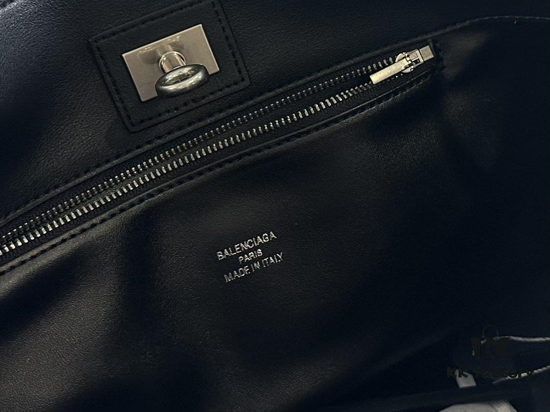 New BALENCIAGA Winter 24 Collection Re-See Shoulder Bucket Bag, Full-Grain Leather, Minimalist Luxury Design, Upcycled Motorbike Glove Clutch with Keychain Closure, Effortlessly Chic Look