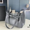 New Balenciaga Winter 24 Collection Re-See Shoulder Bucket Bag, Full-Grain Leather, Minimalist Luxury Design, Upcycled Motorbike Glove Clutch with Keychain Closure, Effortlessly Chic Look