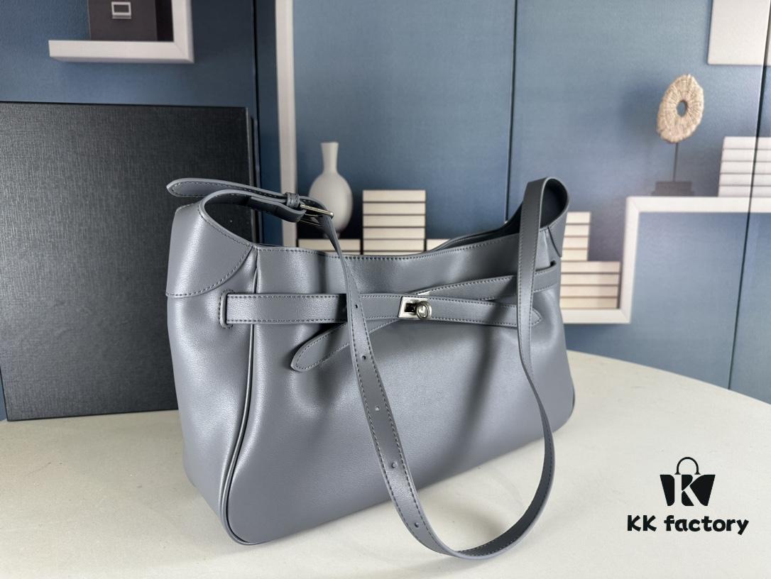 New Balenciaga Winter 24 Collection Re-See Shoulder Bucket Bag, Full-Grain Leather, Minimalist Luxury Design, Upcycled Motorbike Glove Clutch with Keychain Closure, Effortlessly Chic Look