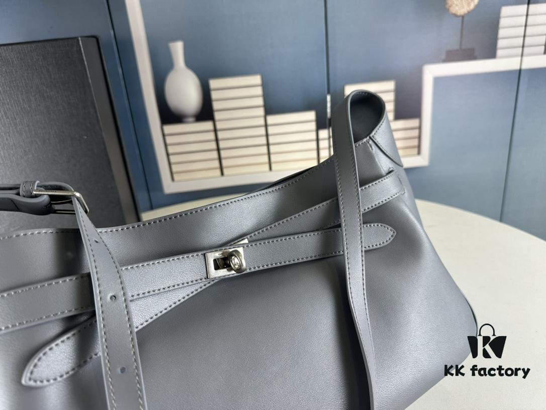 New Balenciaga Winter 24 Collection Re-See Shoulder Bucket Bag, Full-Grain Leather, Minimalist Luxury Design, Upcycled Motorbike Glove Clutch with Keychain Closure, Effortlessly Chic Look