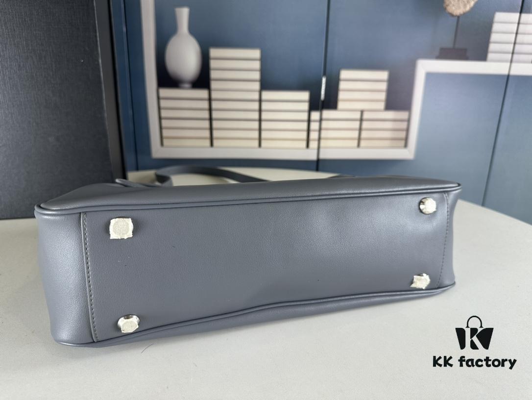 New Balenciaga Winter 24 Collection Re-See Shoulder Bucket Bag, Full-Grain Leather, Minimalist Luxury Design, Upcycled Motorbike Glove Clutch with Keychain Closure, Effortlessly Chic Look