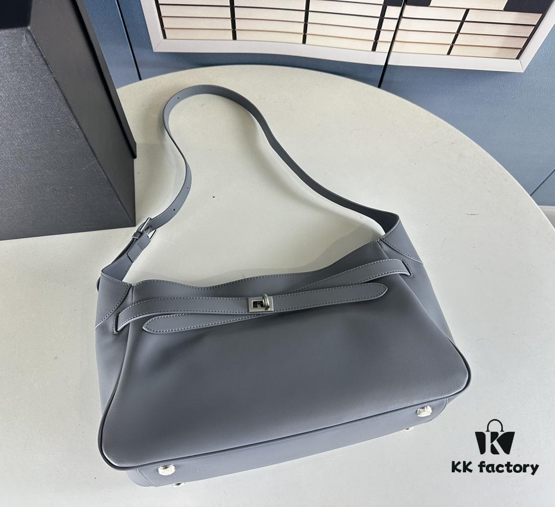 New Balenciaga Winter 24 Collection Re-See Shoulder Bucket Bag, Full-Grain Leather, Minimalist Luxury Design, Upcycled Motorbike Glove Clutch with Keychain Closure, Effortlessly Chic Look