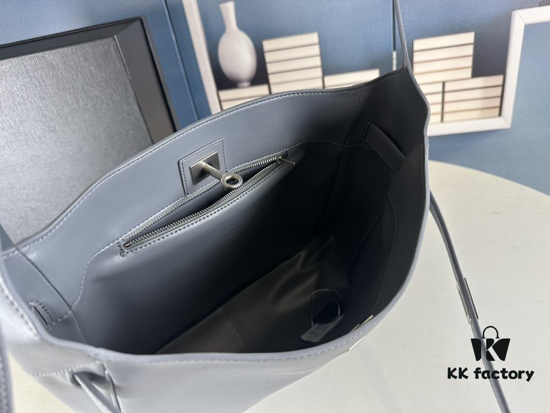 New Balenciaga Winter 24 Collection Re-see Shoulder Bucket Bag, Top Grain Leather, Minimalist Luxury Design, Upcycled Motorcycle Glove Handbag with Keychain Closure, Effortless Chic Style