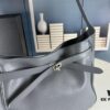 New Balenciaga Winter 24 Collection Re-see Shoulder Bucket Bag, Top Grain Leather, Minimalist Luxury Design, Upcycled Motorcycle Glove Handbag with Keychain Closure, Effortless Chic Style