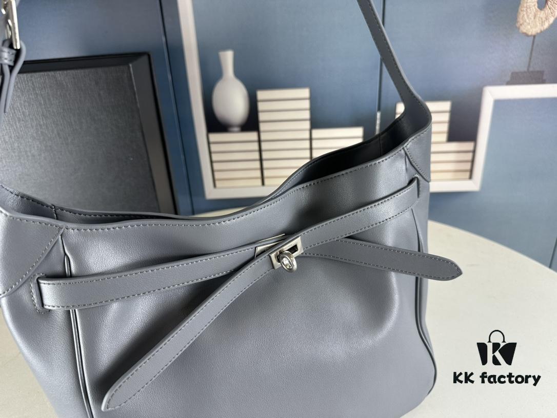 New Balenciaga Winter 24 Collection Re-see Shoulder Bucket Bag, Top Grain Leather, Minimalist Luxury Design, Upcycled Motorcycle Glove Handbag with Keychain Closure, Effortless Chic Style