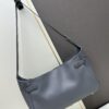 New BALENCIAGA Winter 24 Collection Re-See Shoulder Bucket Bag, Full-Grain Leather, Minimalist Luxury Design, Upcycled Motorcycle Glove Handbag with Keychain Closure, Elegant and Sophisticated Look
