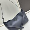 New BALENCIAGA Winter 24 Collection Re-See Shoulder Bucket Bag, Full-Grain Leather, Minimalist Luxury Design, Upcycled Motorcycle Glove Handbag with Keychain Closure, Elegant and Sophisticated Look