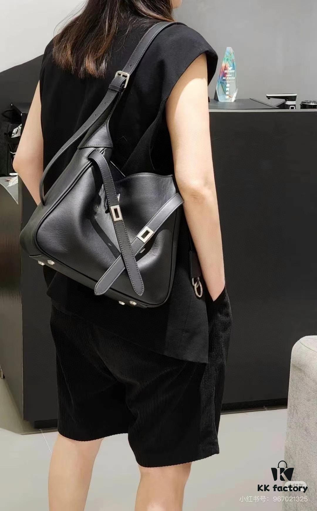 New Balenciaga Winter 24 Collection Re-See Shoulder Bucket Bag, Top-Grain Leather, Minimalist Luxury Design, Upcycled Motorbike Glove Handbag with Keychain Closure, Effortless Chic Style