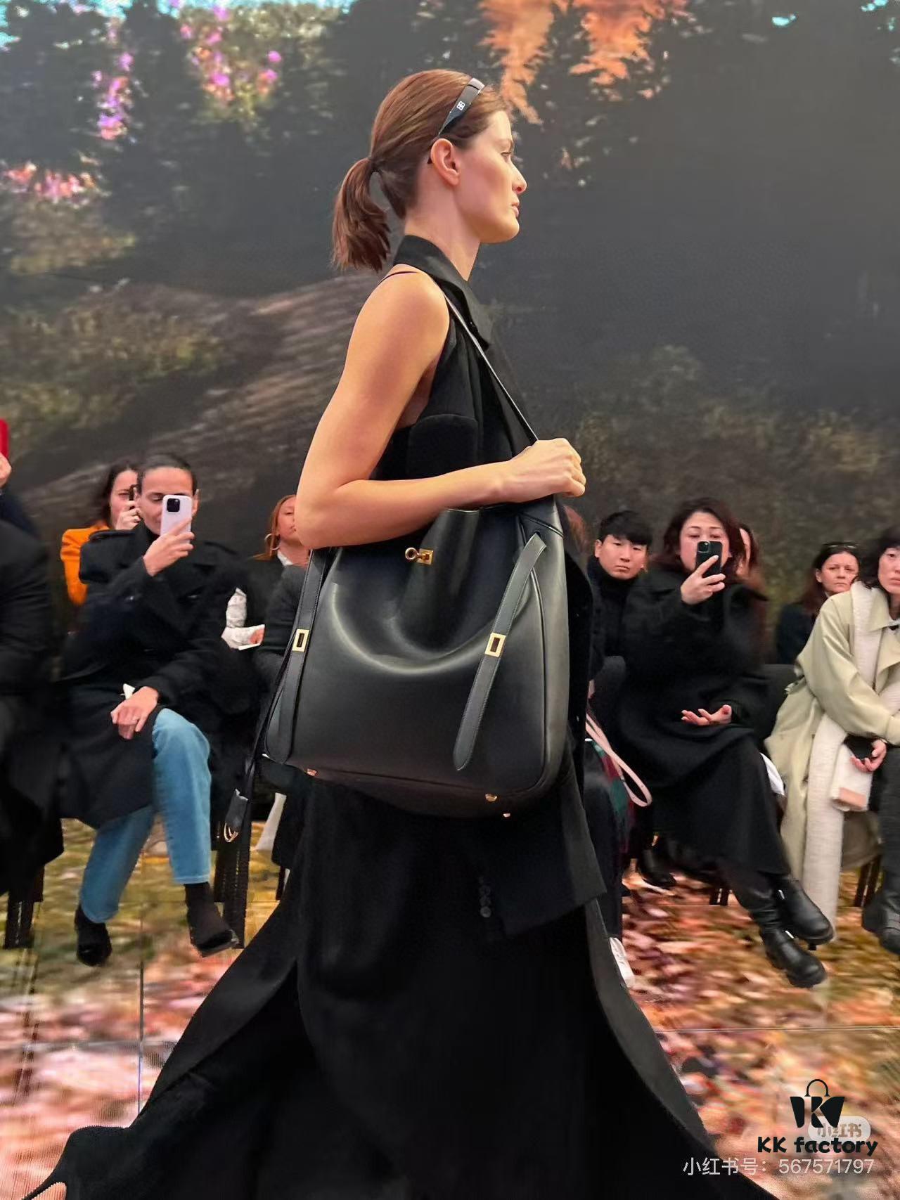 New Balenciaga Winter 24 Collection Re-See Shoulder Bucket Bag, Top-Grain Leather, Minimalist Luxury Design, Upcycled Motorbike Glove Handbag with Keychain Closure, Effortless Chic Style