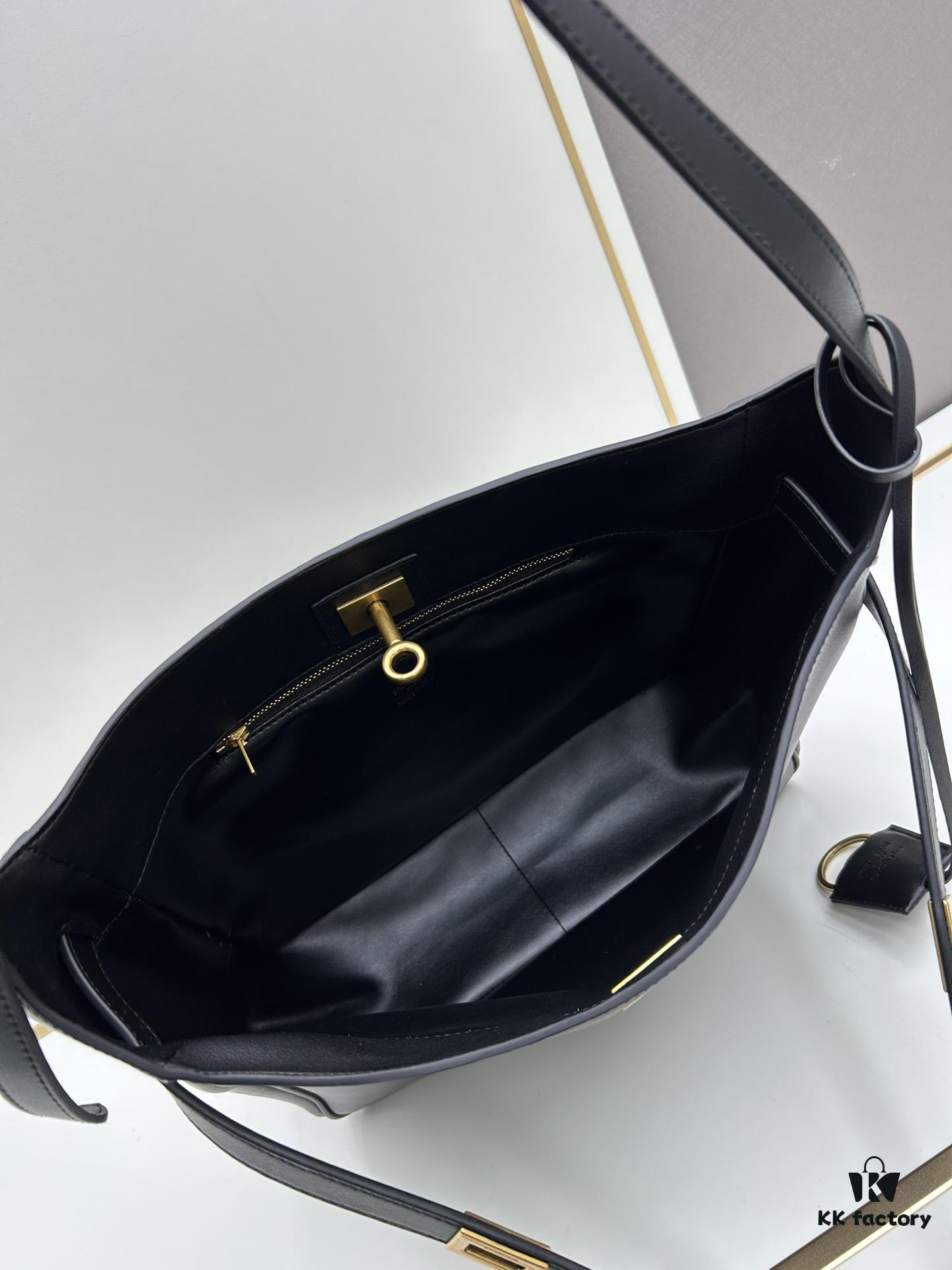 New Balenciaga Winter 24 Collection Re-see Handbag, Shoulder Bucket Bag in Full-Grain Leather, Minimalist Luxury Design Upcycled from Motorcycle Gloves with Keychain Closure, Effortlessly Chic Oversized Look